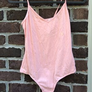pink body suit